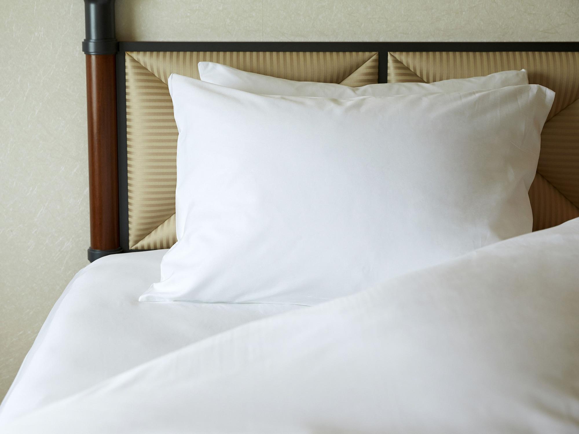Miyako Hotel Gifu Nagaragawa Exteriér fotografie A pillow on a bed
